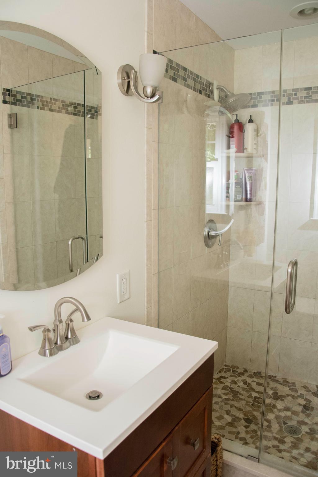2802 Waterford Drive Cinnaminson, NJ 08077 - Photo 39 of 59 a bathroom with a sink and a shower
