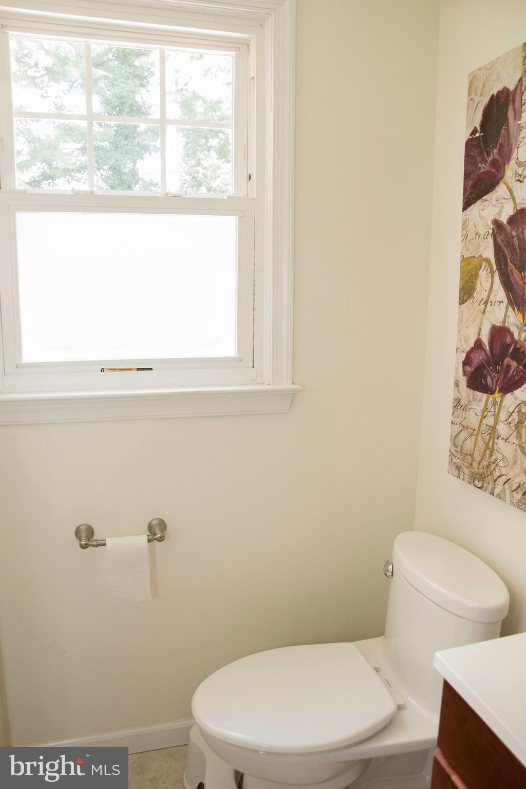 2802 Waterford Drive Cinnaminson, NJ 08077 - Photo 40 of 59 a white toilet sitting next to a window in a bathroom