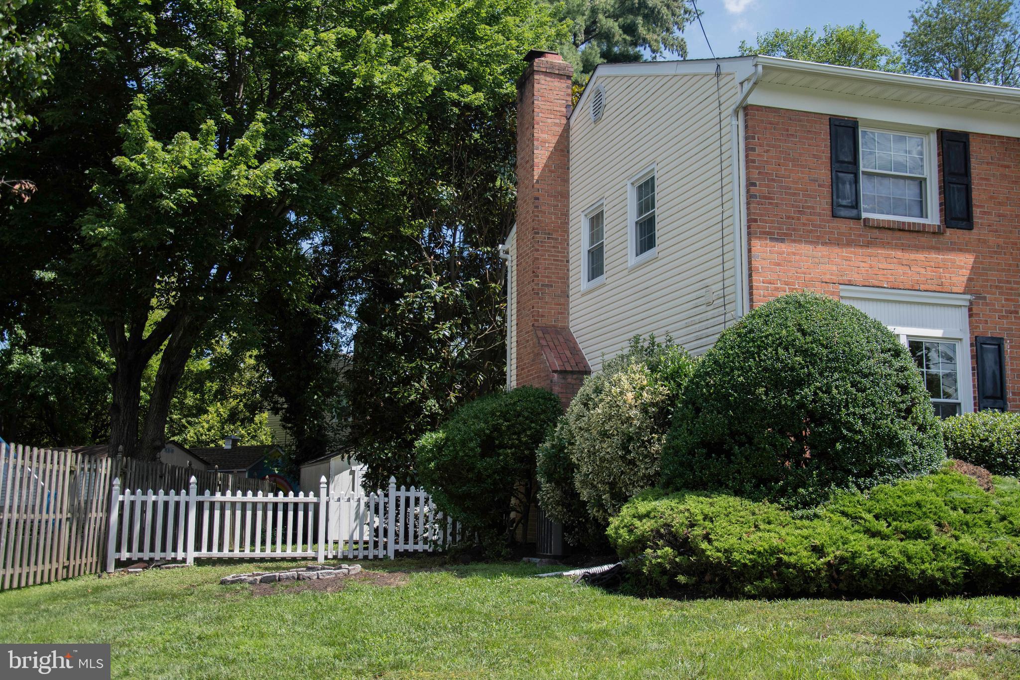 2802 Waterford Drive Cinnaminson, NJ 08077 - Photo 4 of 59 a front view of a house with garden
