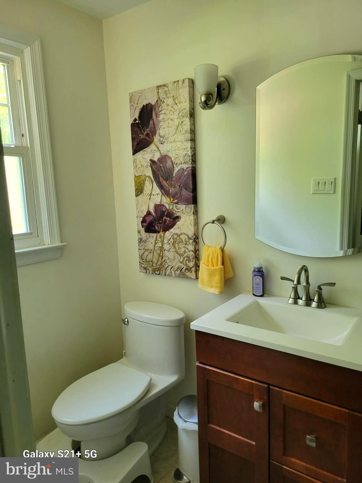 2802 Waterford Drive Cinnaminson, NJ 08077 - Photo 41 of 59 a bathroom with a sink a toilet and mirror