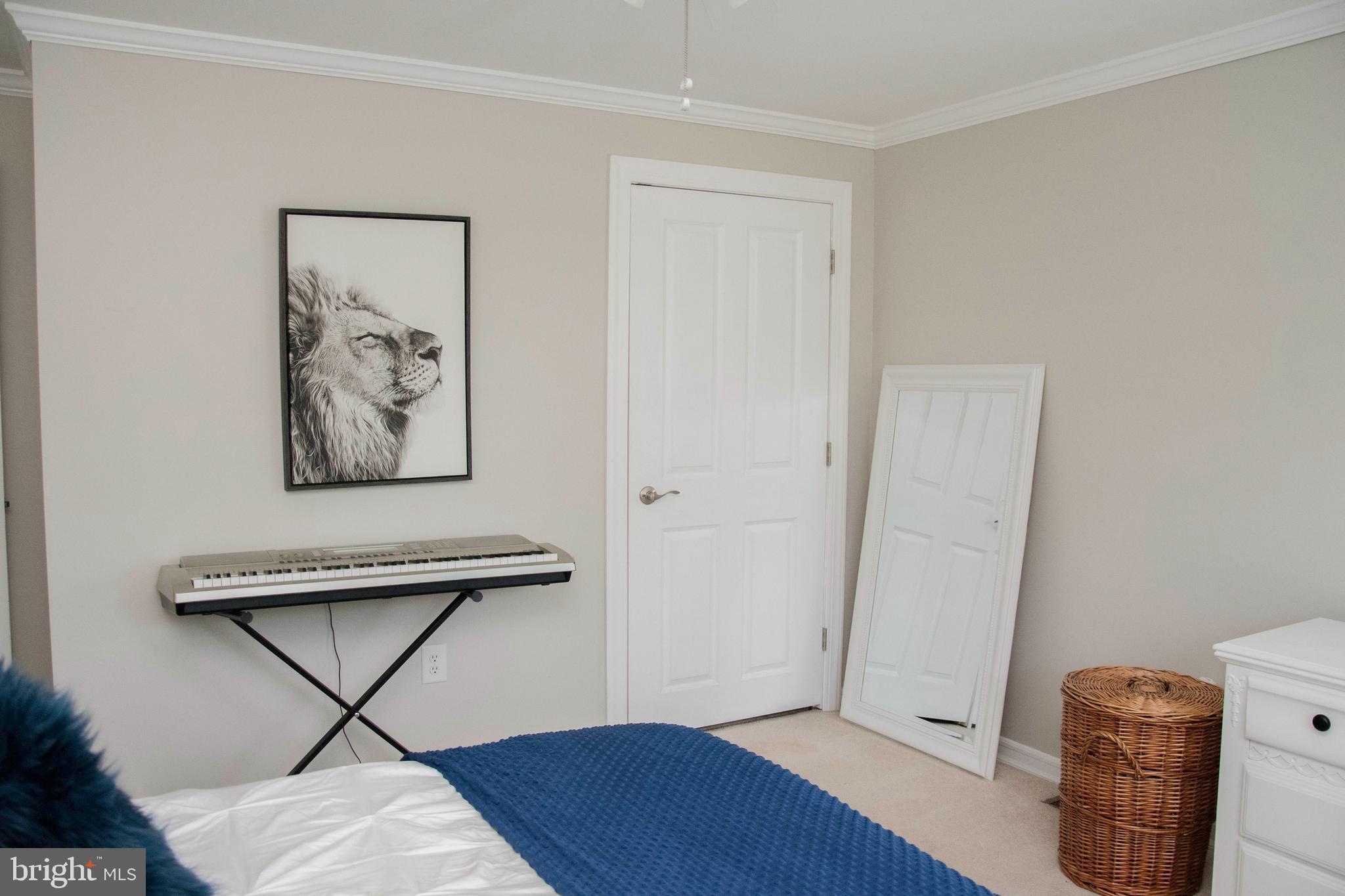 2802 Waterford Drive Cinnaminson, NJ 08077 - Photo 48 of 59 a view of an empty room with a painting on the wall