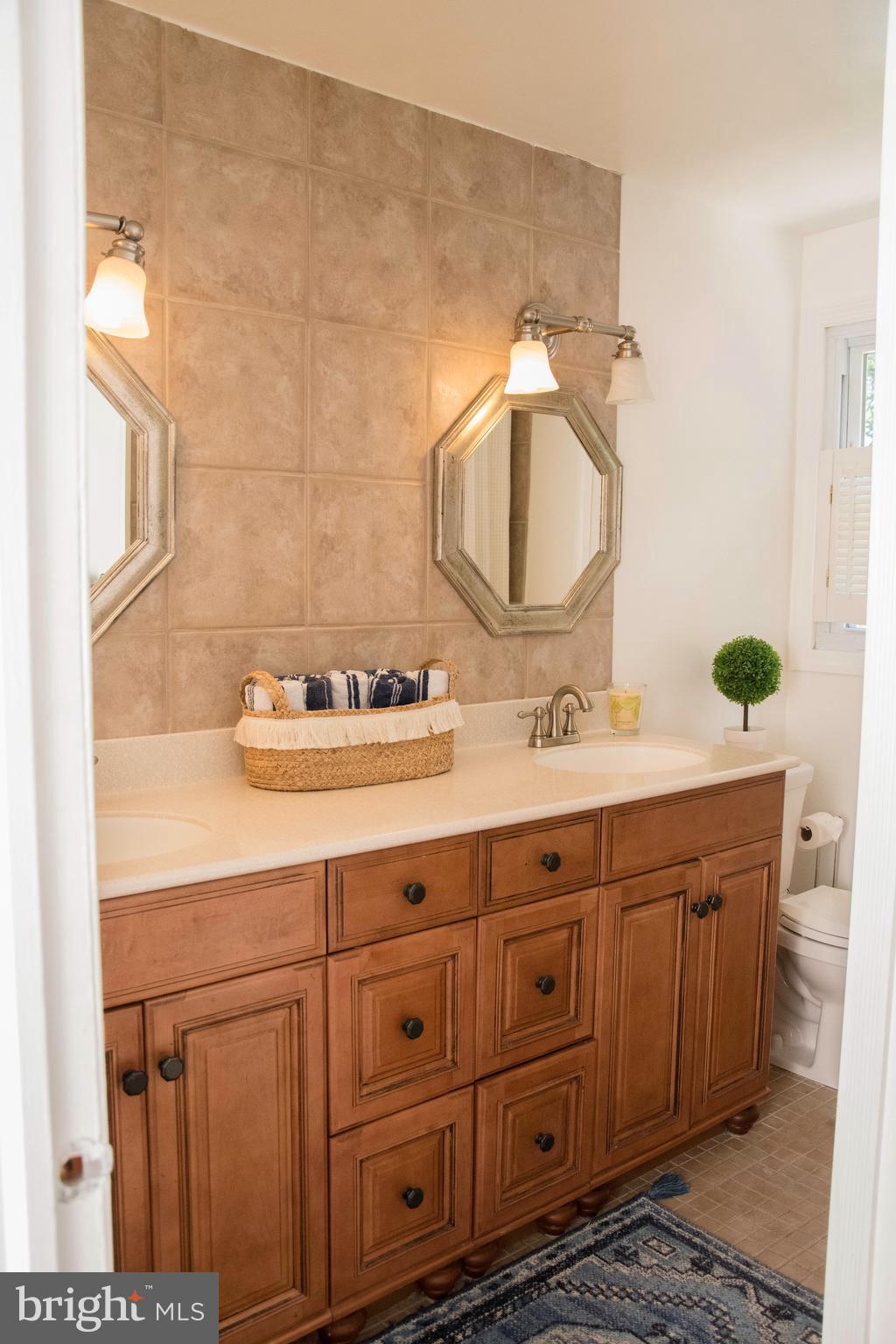 2802 Waterford Drive Cinnaminson, NJ 08077 - Photo 53 of 59 a bathroom with a granite countertop double vanity sink and a mirror