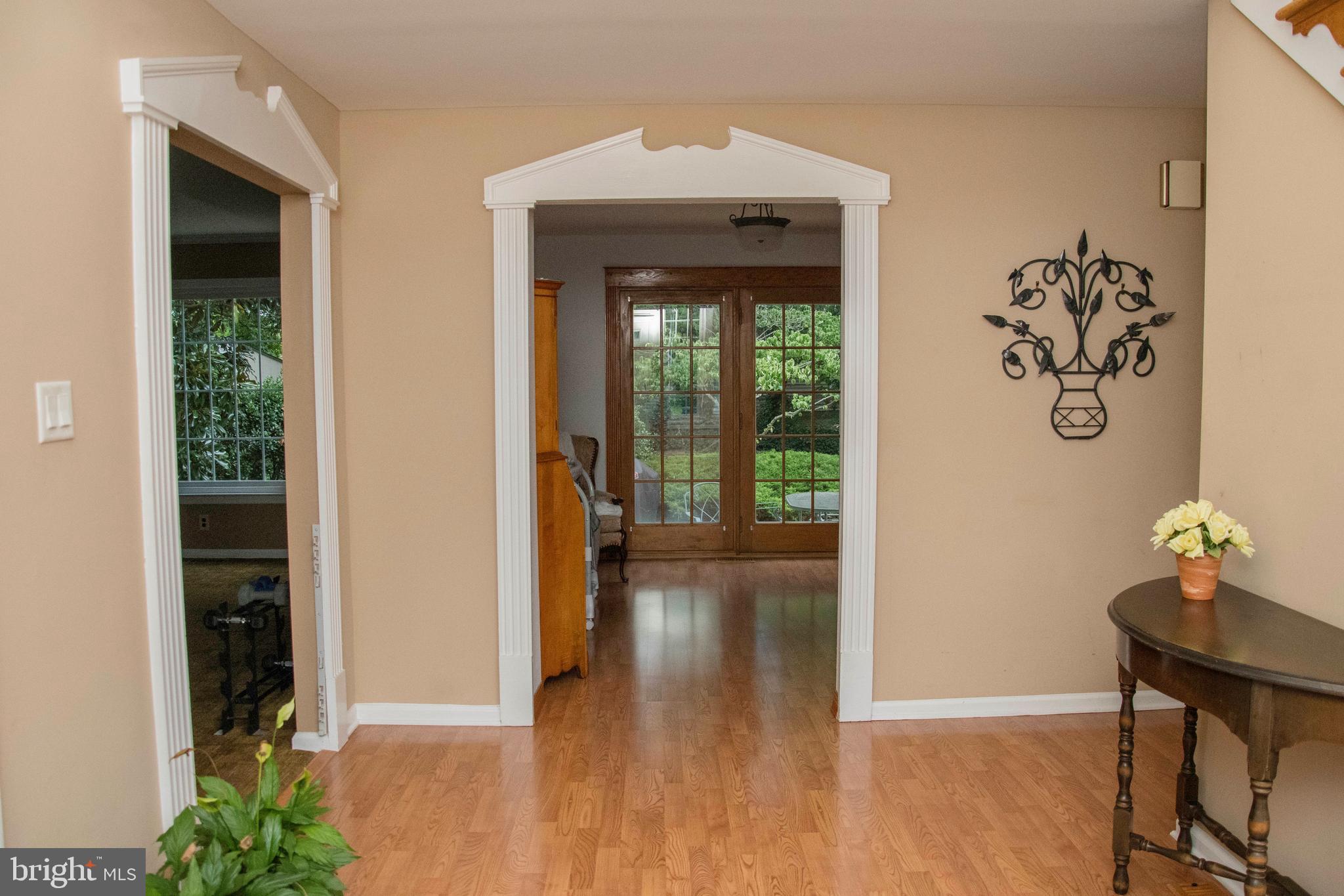 2802 Waterford Drive Cinnaminson, NJ 08077 - Photo 7 of 59 a view of hallway with wooden floor and a potted plant