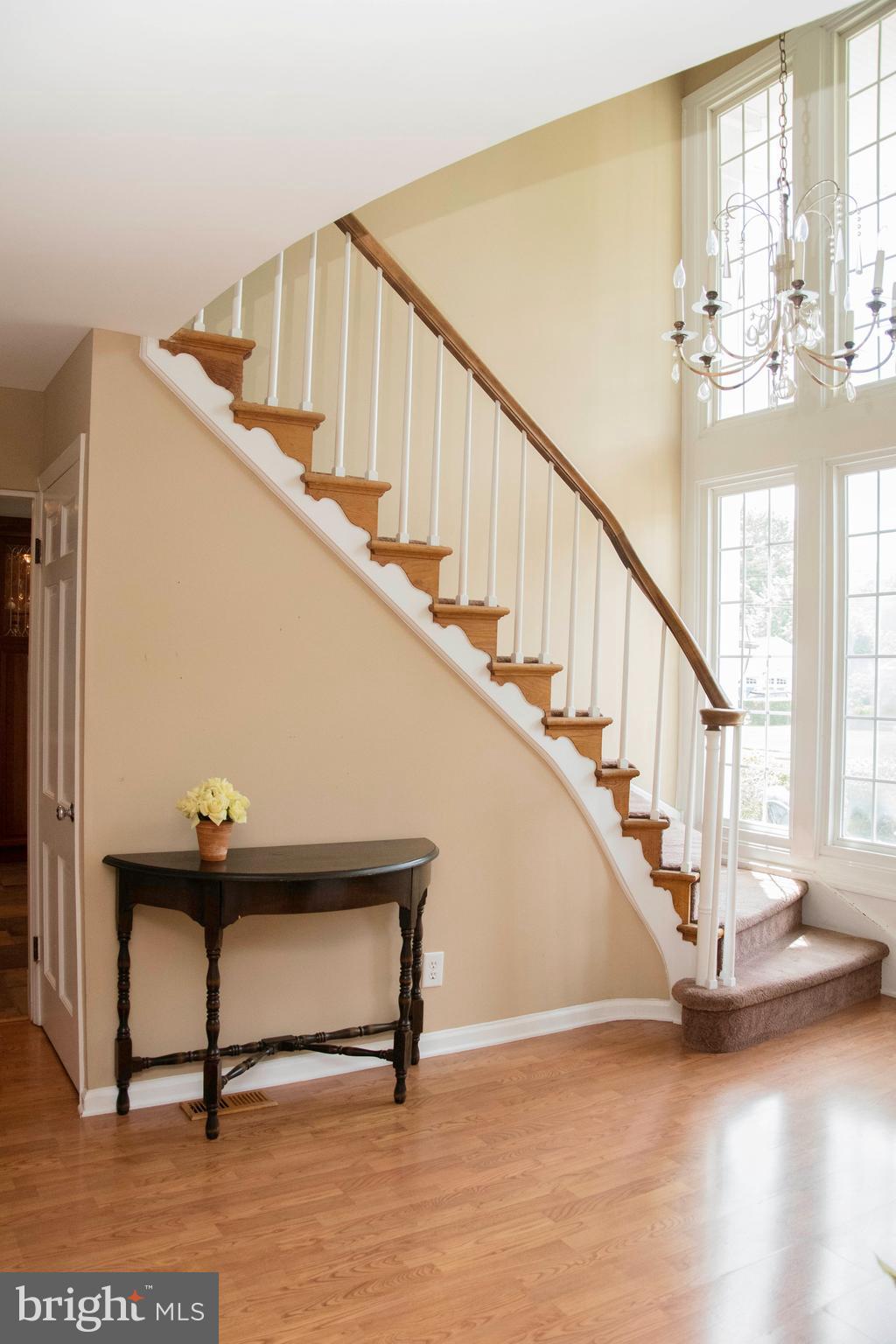2802 Waterford Drive Cinnaminson, NJ 08077 - Photo 9 of 59 a view of entryway and hall with wooden floor