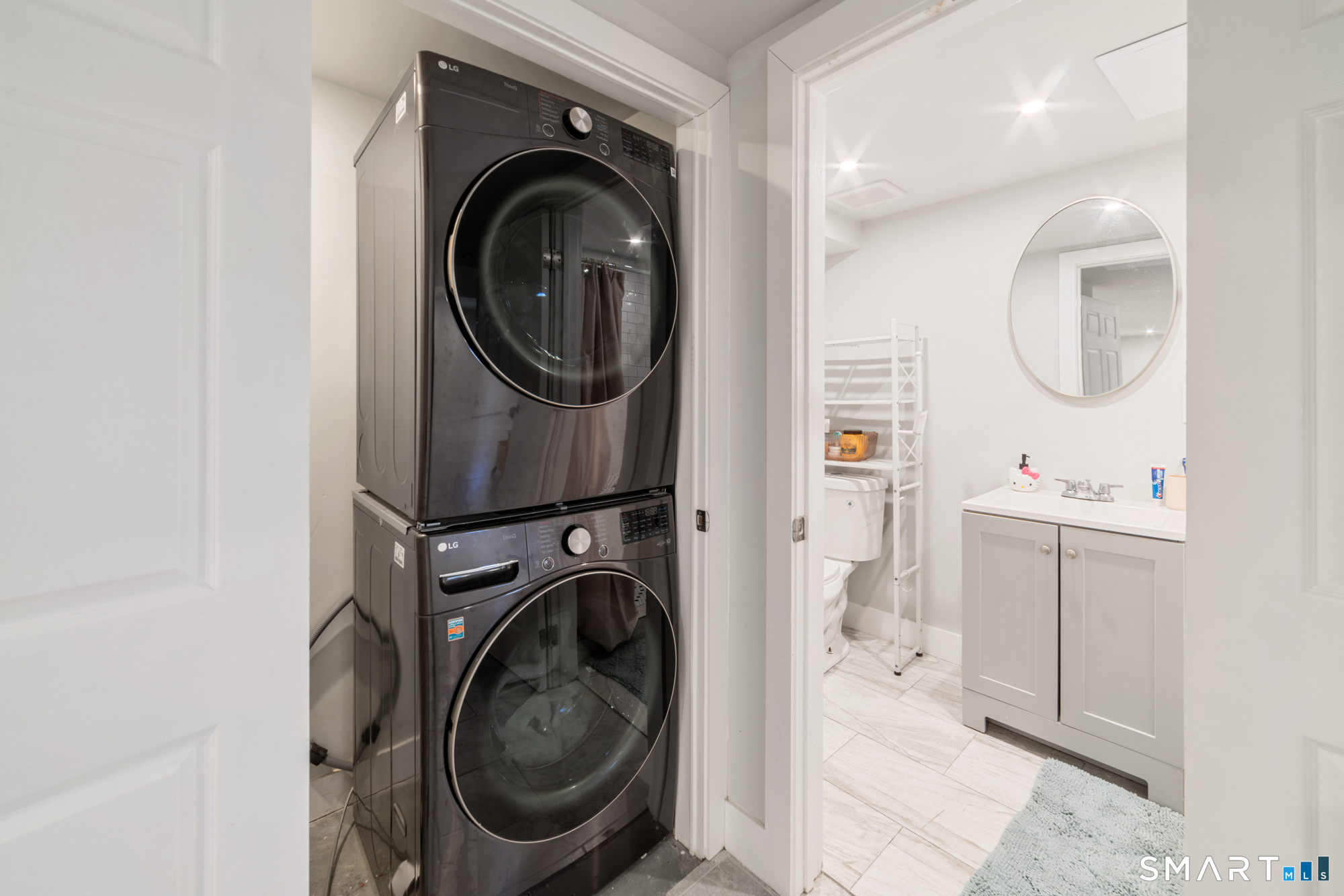 327 Lakeside Boulevard West Waterbury, CT 06708 - Photo 20 of 29 a utility room with sink dryer and washer