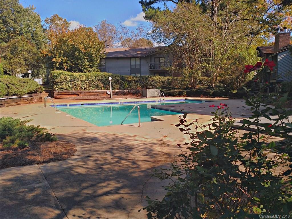 5024 P Sardis Road Charlotte, NC 28270 - Photo 11 of 12 a view of a house with a yard and sitting area