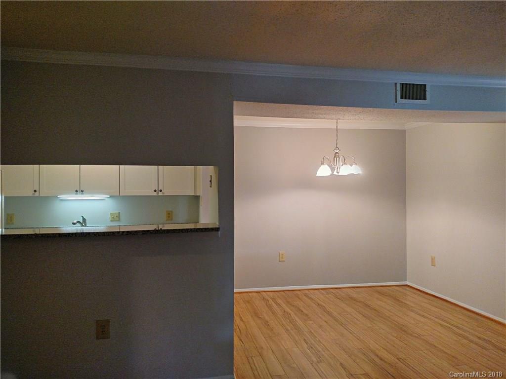 5024 P Sardis Road Charlotte, NC 28270 - Photo 4 of 12 a view of a kitchen with a sink and cabinets