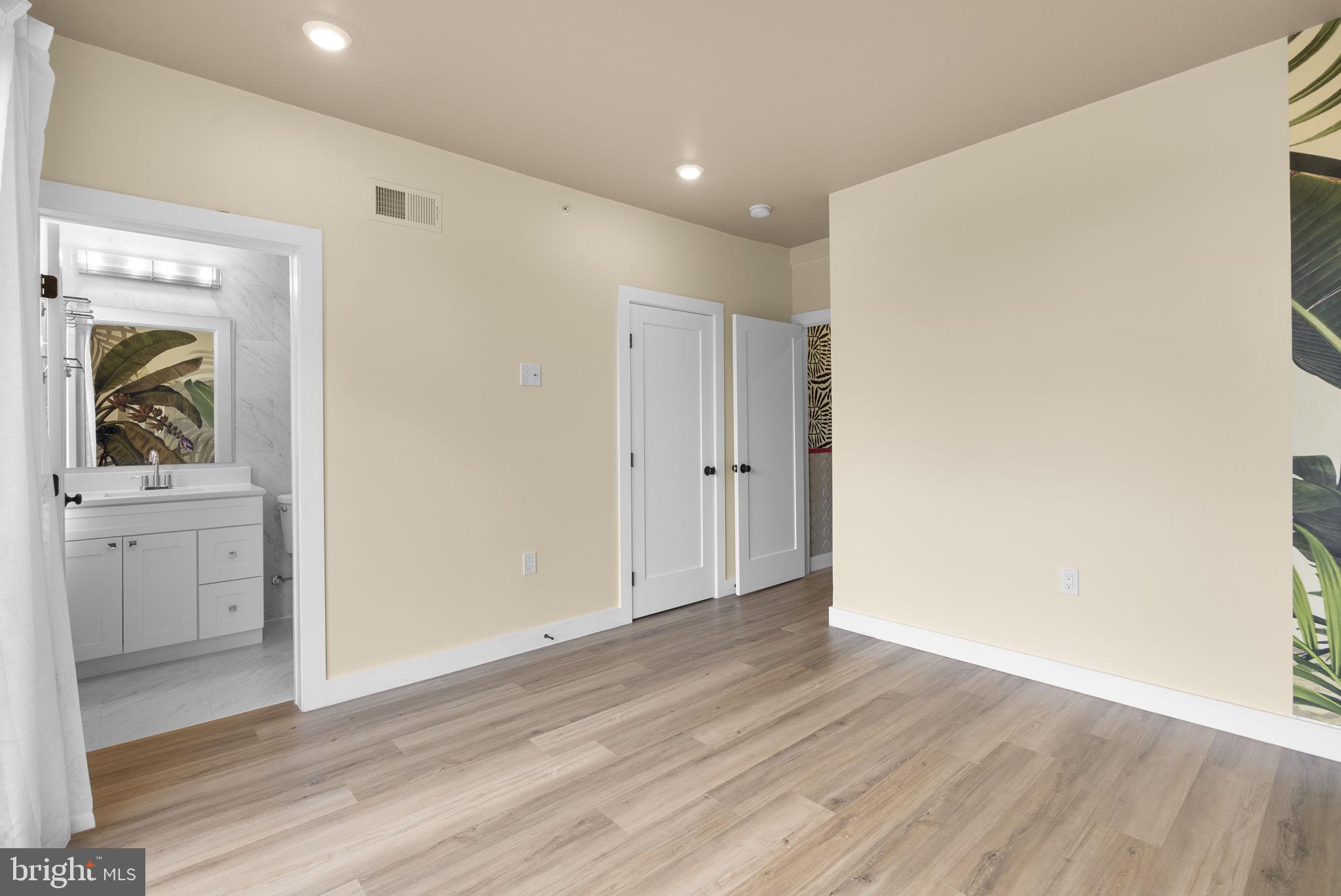 2325 High Street Southeast, Unit 3 Washington, DC 20020 - Photo 22 of 28 a view of a hallway view with wooden floor and closet