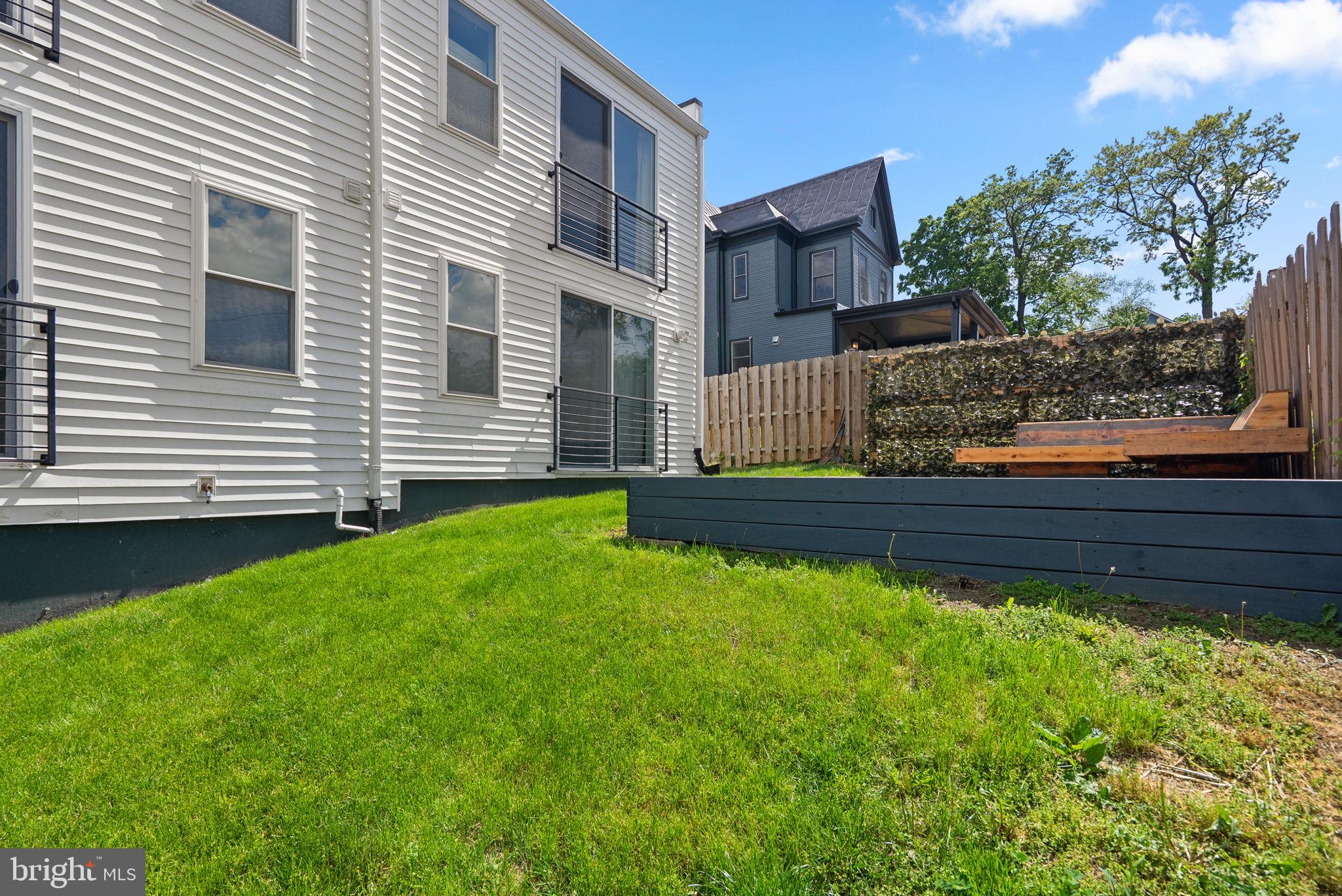 2325 High Street Southeast, Unit 3 Washington, DC 20020 - Photo 26 of 28 a view of a back yard of the house