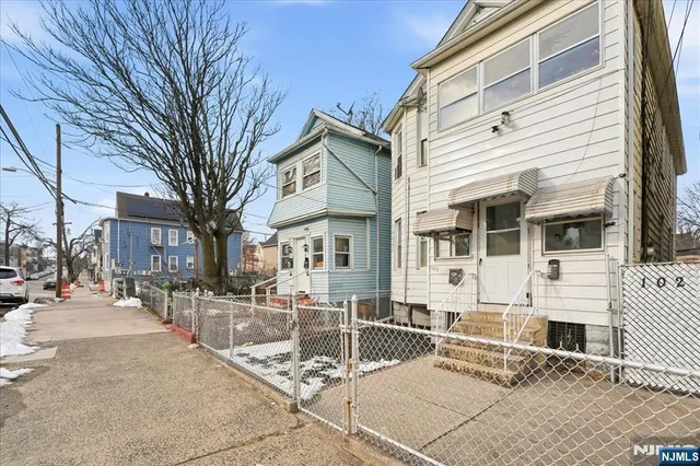 a view of a building with sitting area