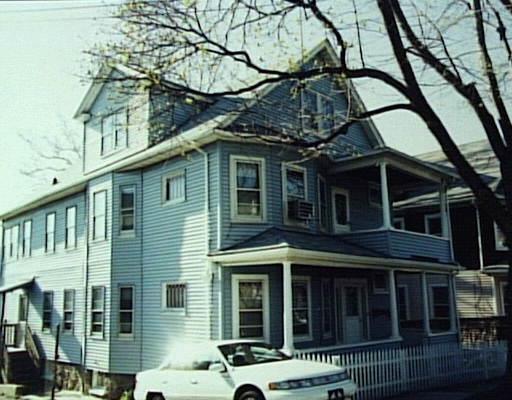 a front view of a house with balcony