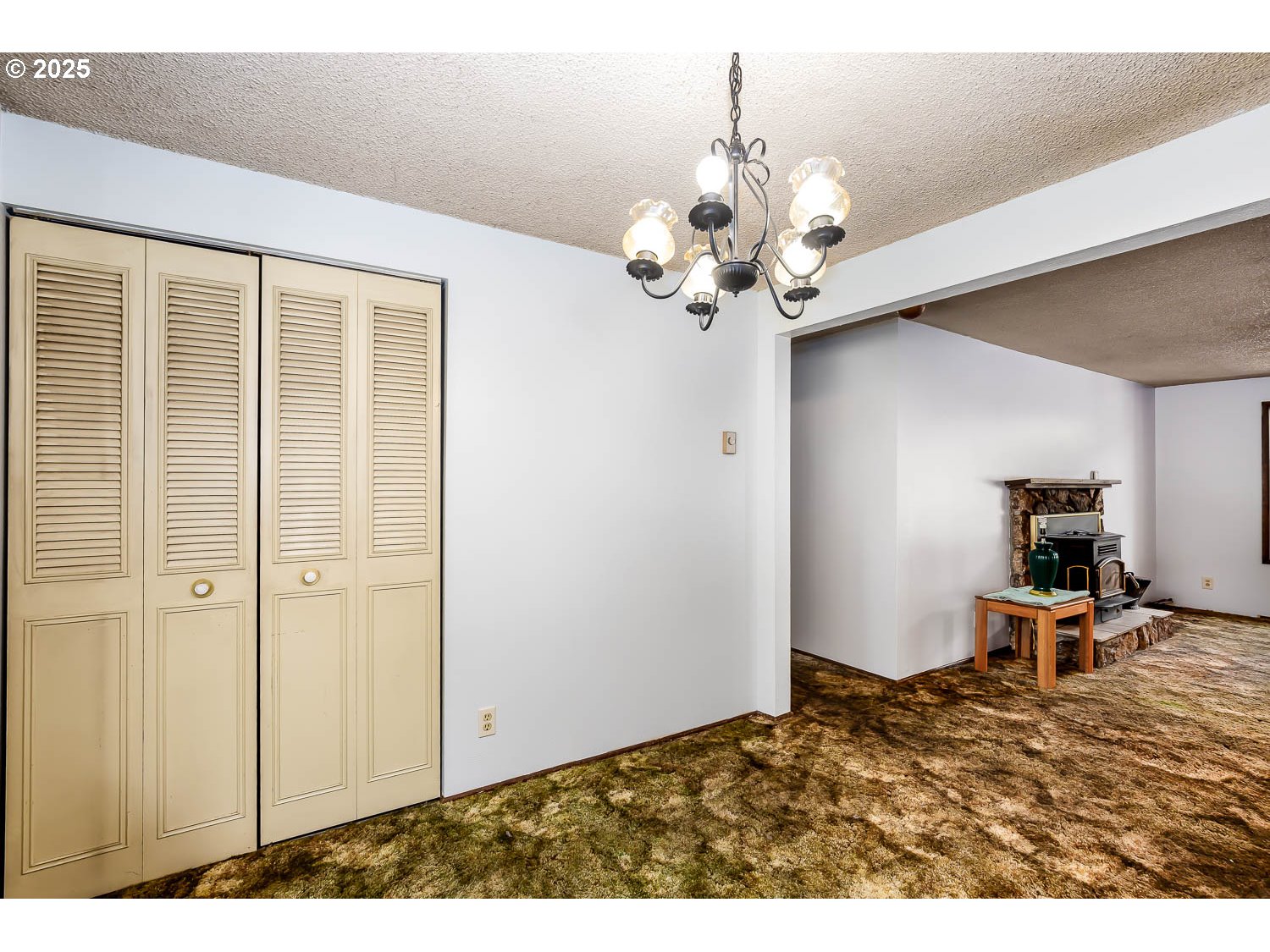 47711 Commercial Street Oakridge, OR 97463 - Photo 11 of 32 a view of an empty room with a window