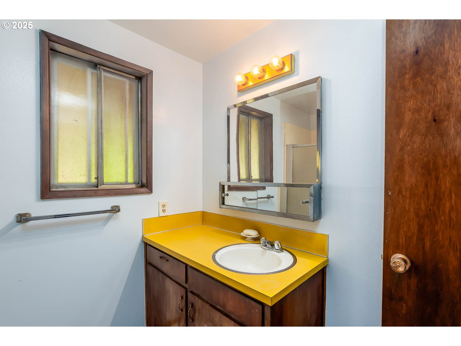 47711 Commercial Street Oakridge, OR 97463 - Photo 19 of 32 a bathroom with a sink and a mirror