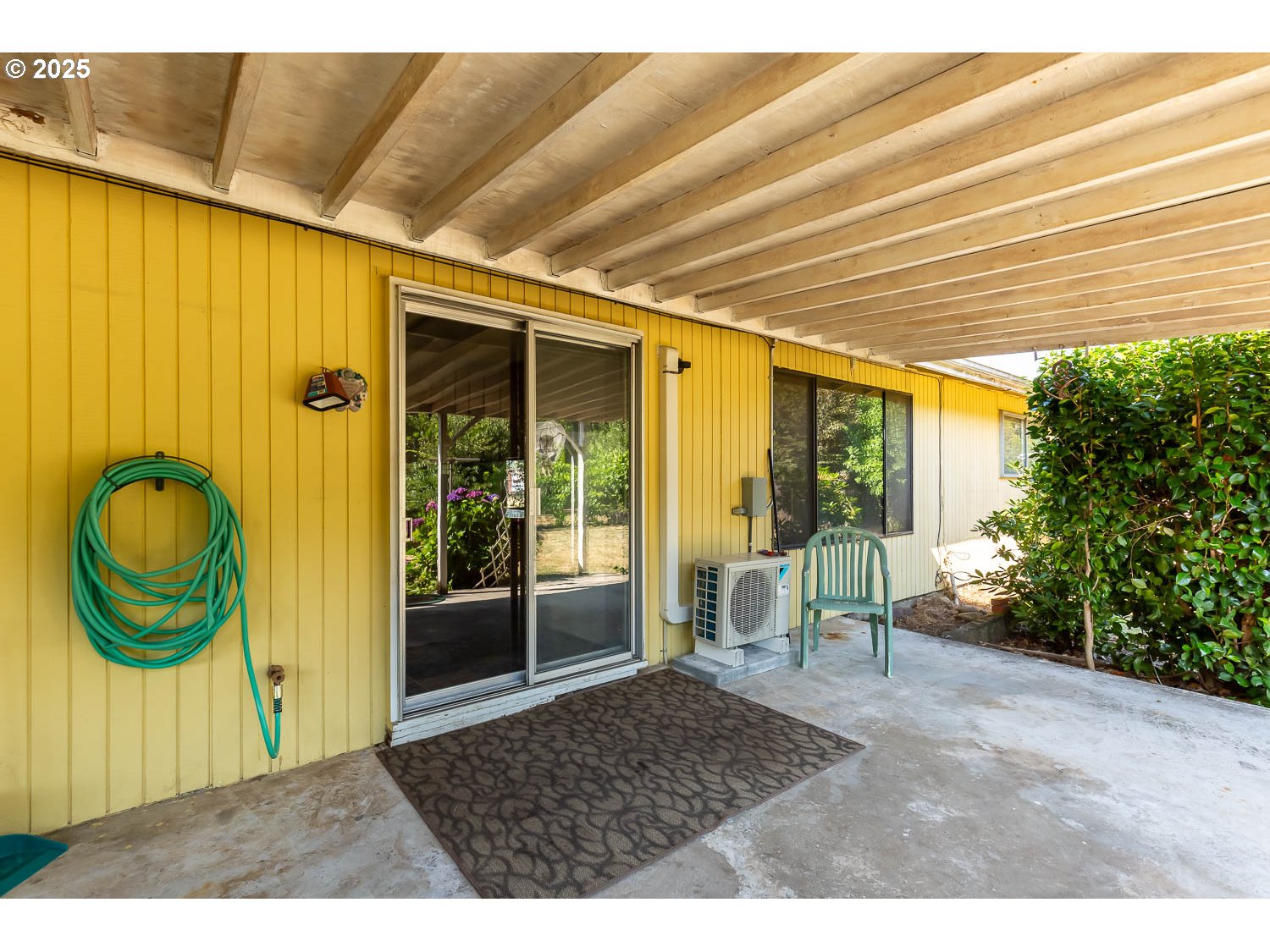 47711 Commercial Street Oakridge, OR 97463 - Photo 26 of 32 a backyard of a house with yard and outdoor seating