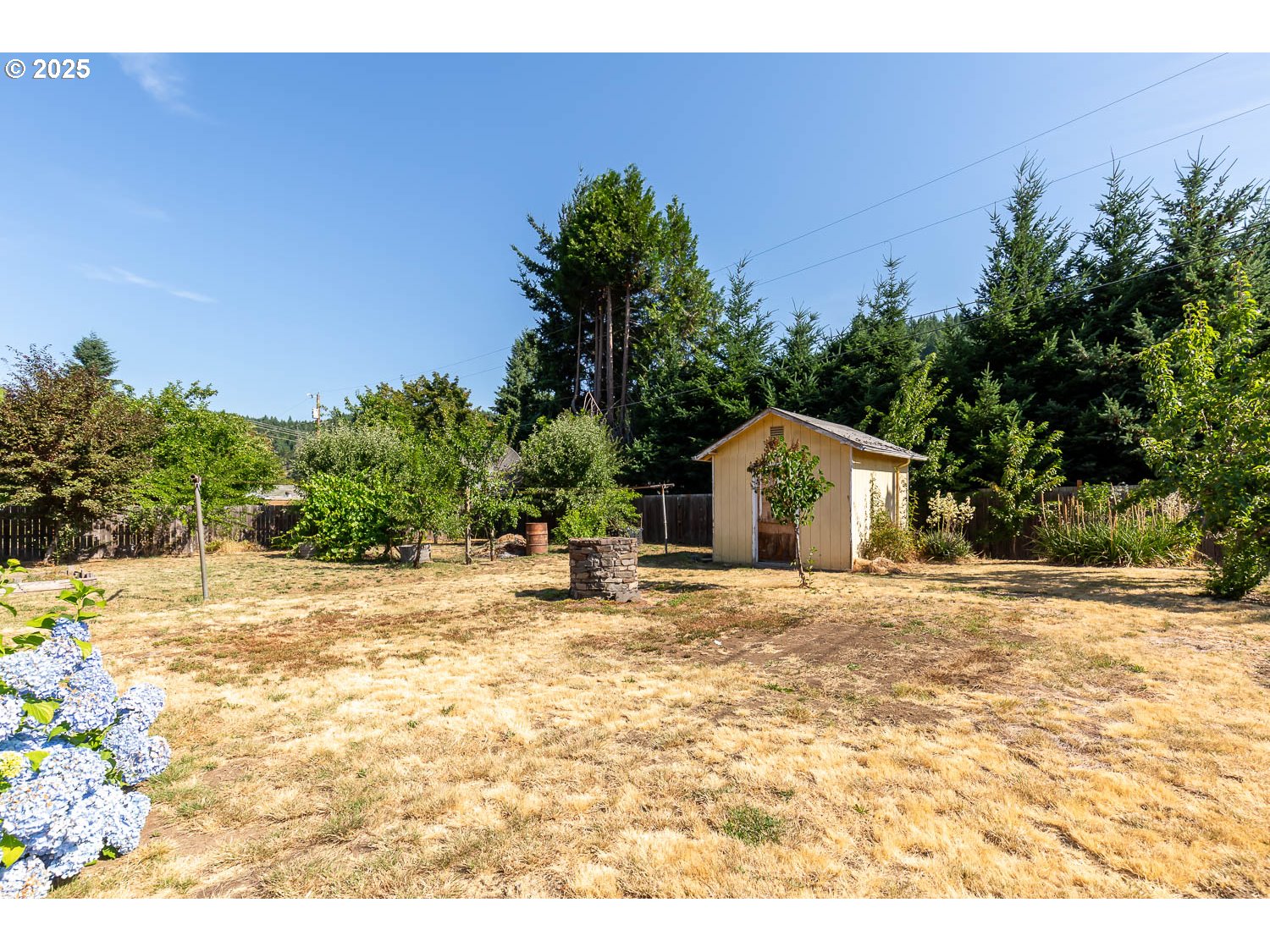 47711 Commercial Street Oakridge, OR 97463 - Photo 28 of 32 a bathroom with a sink and a yard