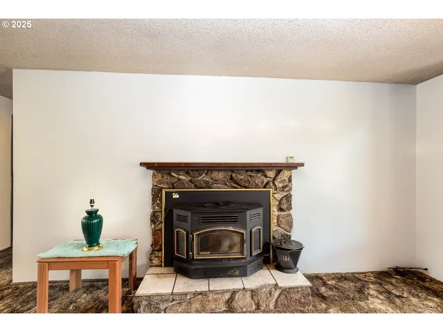a living room with a fireplace