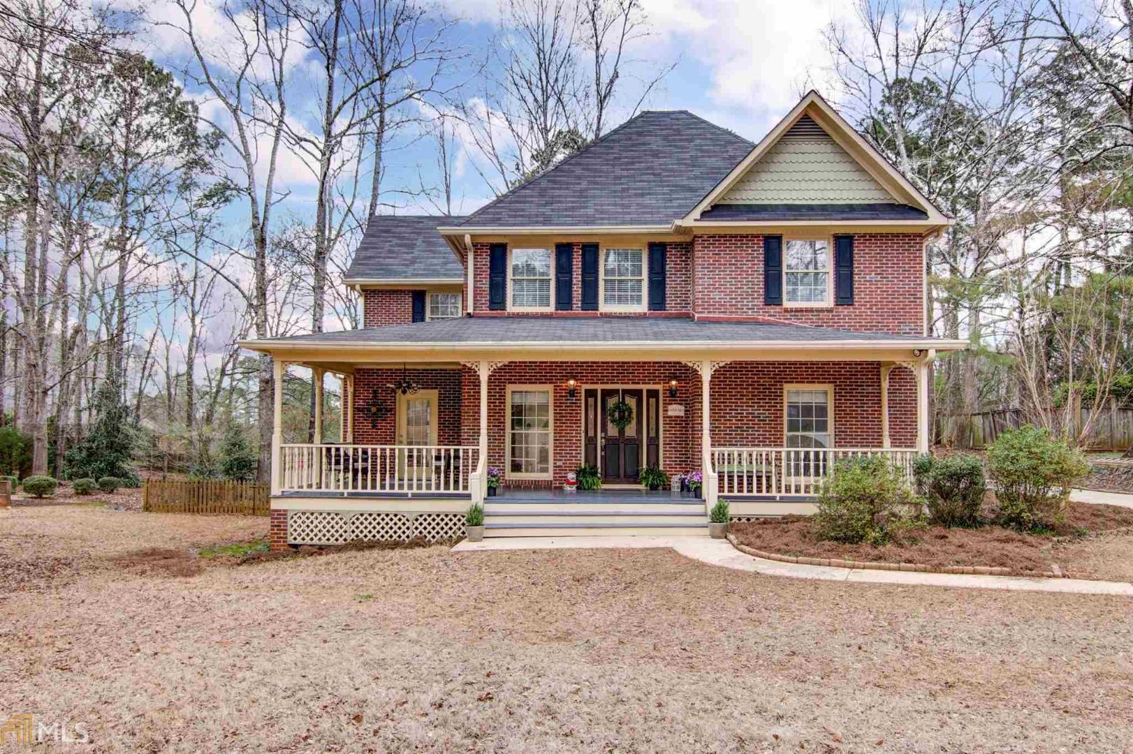 171 Chesterfield Road Bogart, GA 30622 - Photo 1 of 1 a front view of a house with a garden