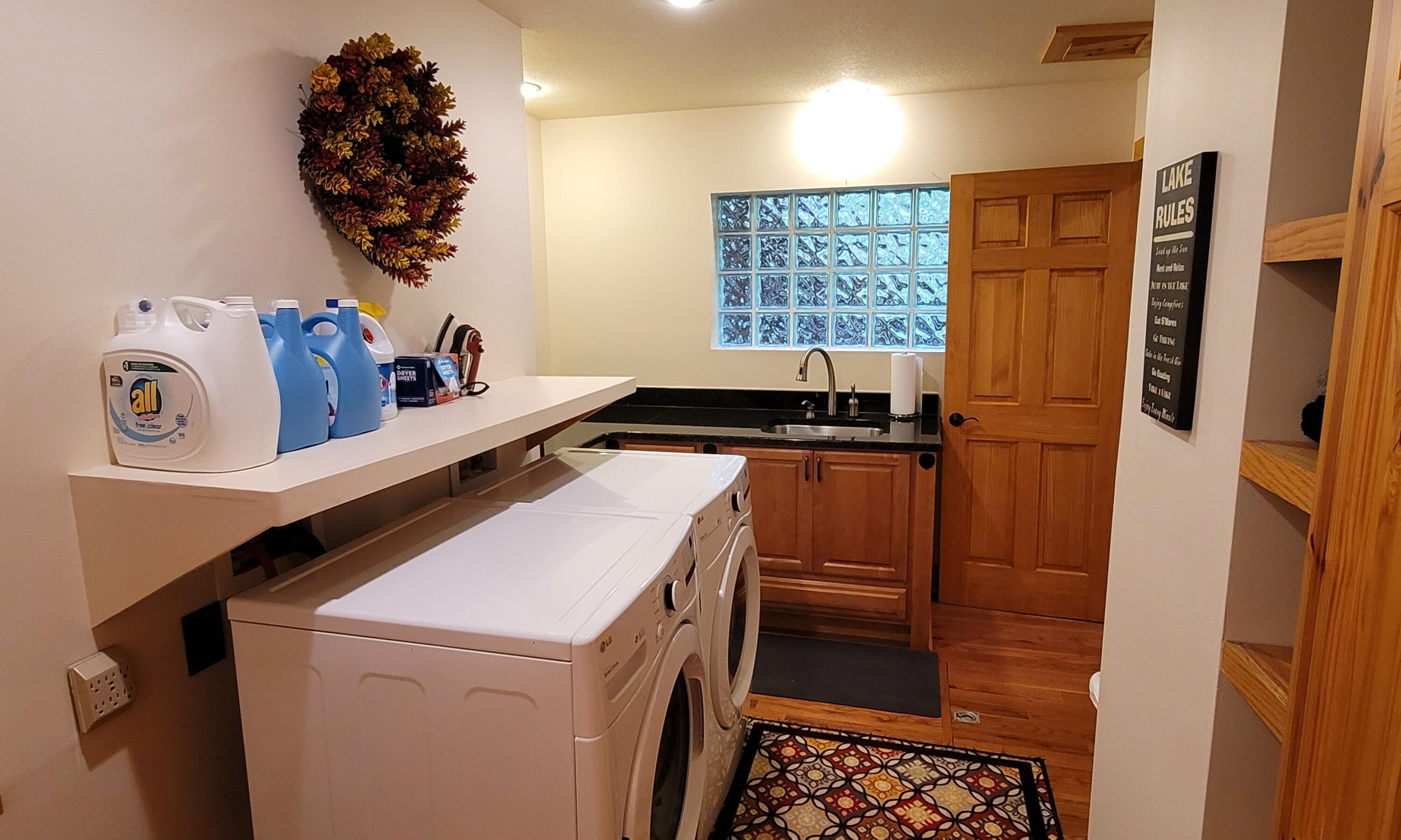 3219 Draft Road Butler, TN 37640 - Photo 31 of 50 LAUNDRY RM/SINK & STORAGE