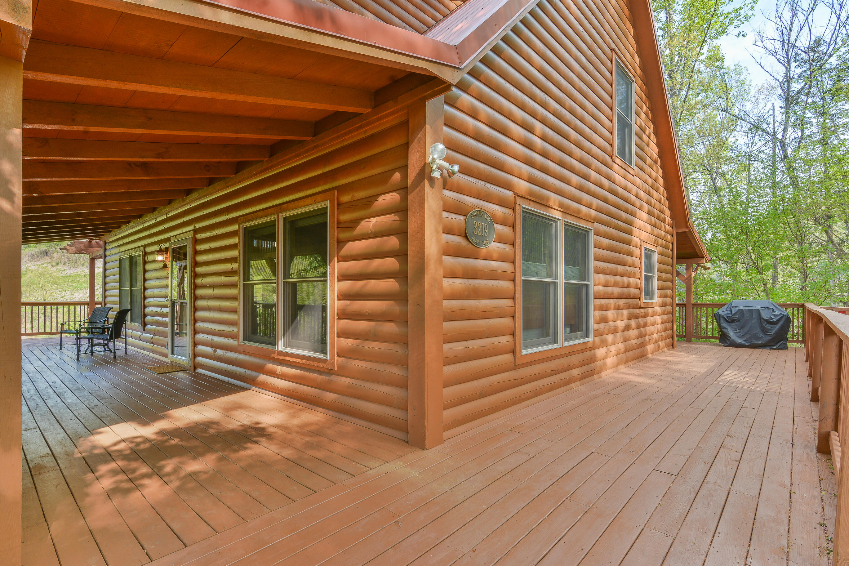 3219 Draft Road Butler, TN 37640 - Photo 49 of 50 MAIN LEVEL WRAP A ROUND DECK