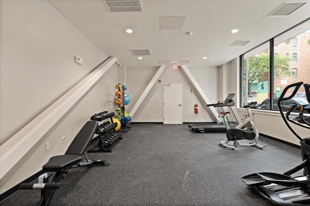 211 Green Street, Unit 508 Boston, MA 02130 - Photo 10 of 11 a view of a room with gym equipment