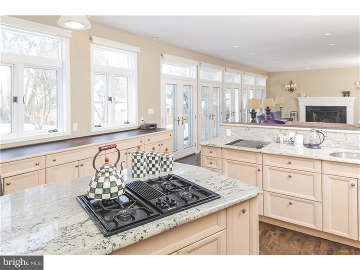 22 Wilson Road Princeton, NJ 08540 - Photo 13 of 25 a kitchen with a stove a sink and a window