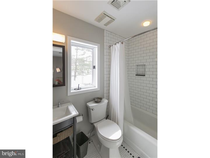 22 Wilson Road Princeton, NJ 08540 - Photo 20 of 25 a bathroom with a toilet and a shower