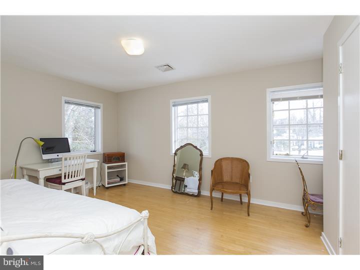 22 Wilson Road Princeton, NJ 08540 - Photo 22 of 25 a room with a bed and a chair