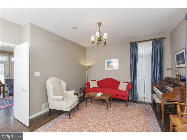 22 Wilson Road Princeton, NJ 08540 - Photo 5 of 25 a living room with furniture and a chandelier