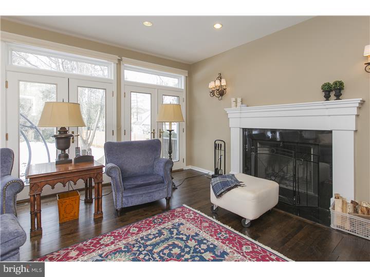 22 Wilson Road Princeton, NJ 08540 - Photo 9 of 25 a living room with furniture and a fireplace