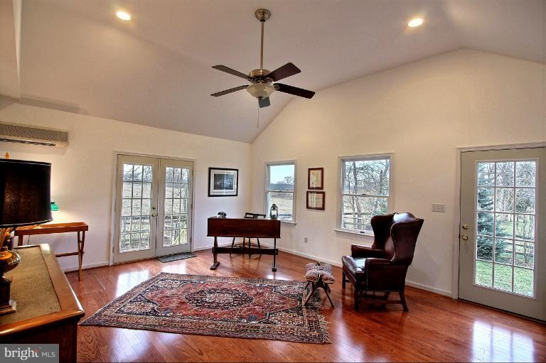 20003 Hickman Way Poolesville, MD 20837 - Photo 2 of 30 a living room with furniture and wooden floor