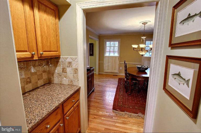 20003 Hickman Way Poolesville, MD 20837 - Photo 12 of 30 a view of living room kitchen and dining area