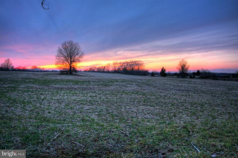 20003 Hickman Way Poolesville, MD 20837 - Photo 13 of 30 a view of sunset and green space