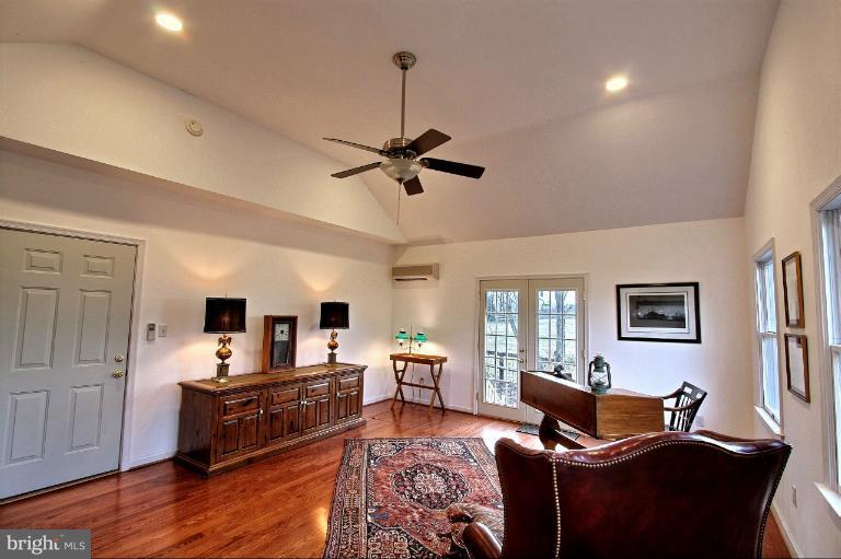 20003 Hickman Way Poolesville, MD 20837 - Photo 3 of 30 a living room with furniture and wooden floor