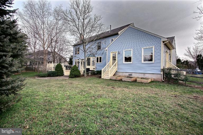 20003 Hickman Way Poolesville, MD 20837 - Photo 21 of 30 a view of a house with a yard