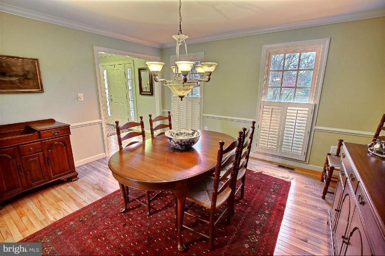 20003 Hickman Way Poolesville, MD 20837 - Photo 23 of 30 a view of a dining room with furniture window and wooden floor