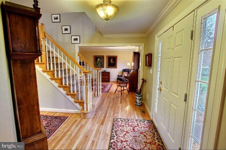 20003 Hickman Way Poolesville, MD 20837 - Photo 24 of 30 a view of entryway with wooden floor