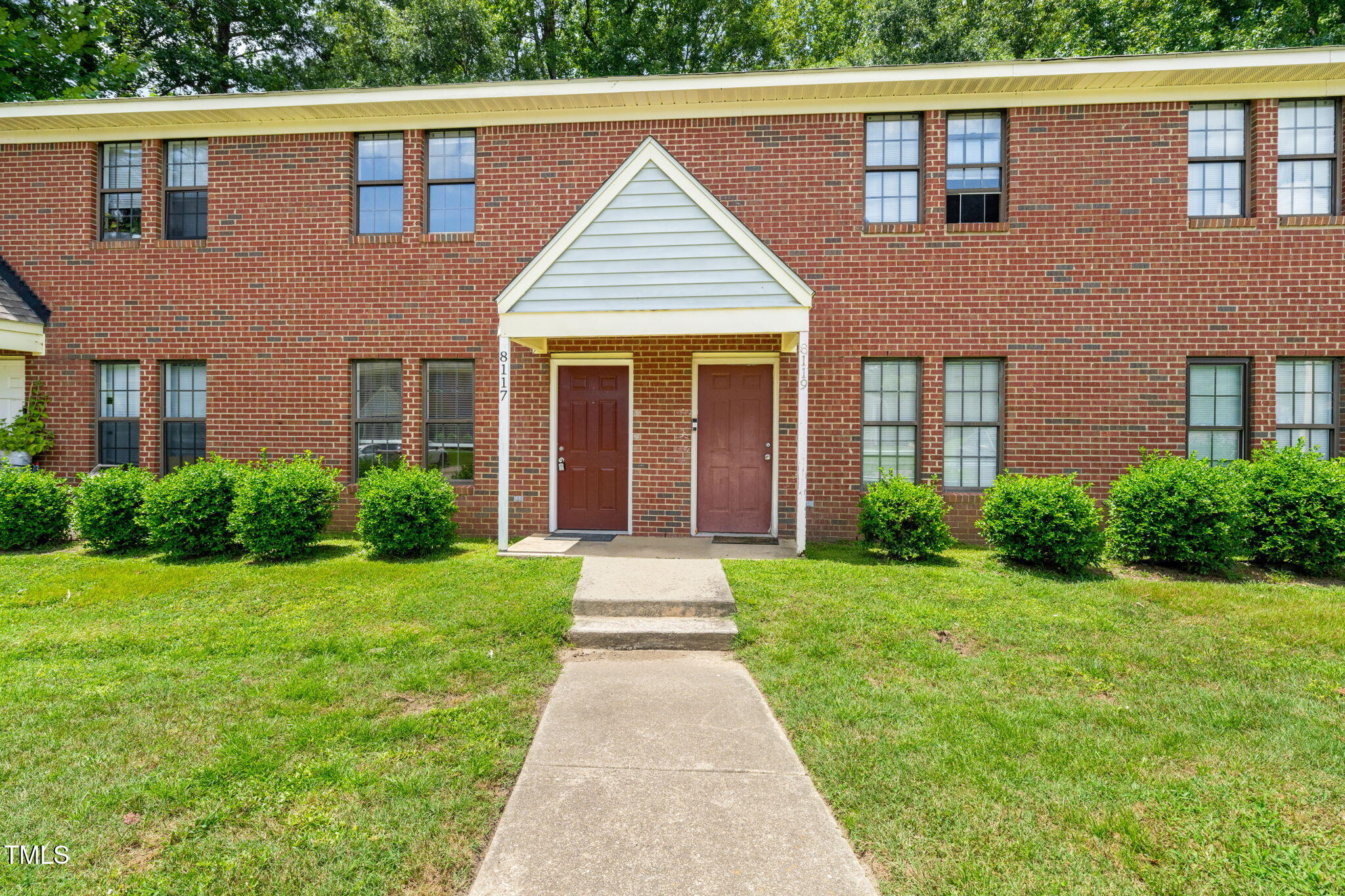 8117 Farmlea Circle Raleigh, NC 27616 - Photo 1 of 20 a front view of a house with yard
