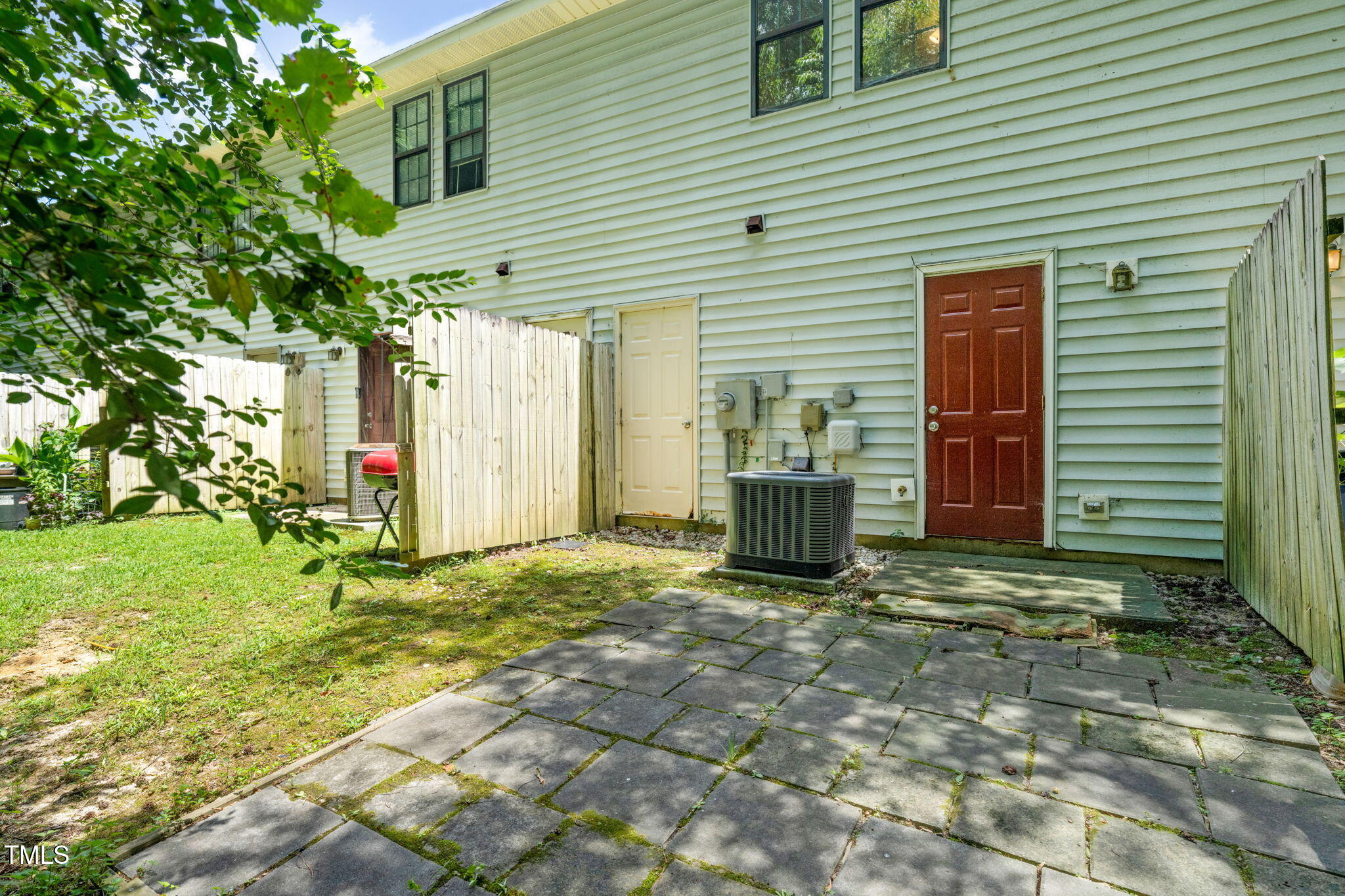 8117 Farmlea Circle Raleigh, NC 27616 - Photo 15 of 20 a view of a house with backyard and a tree