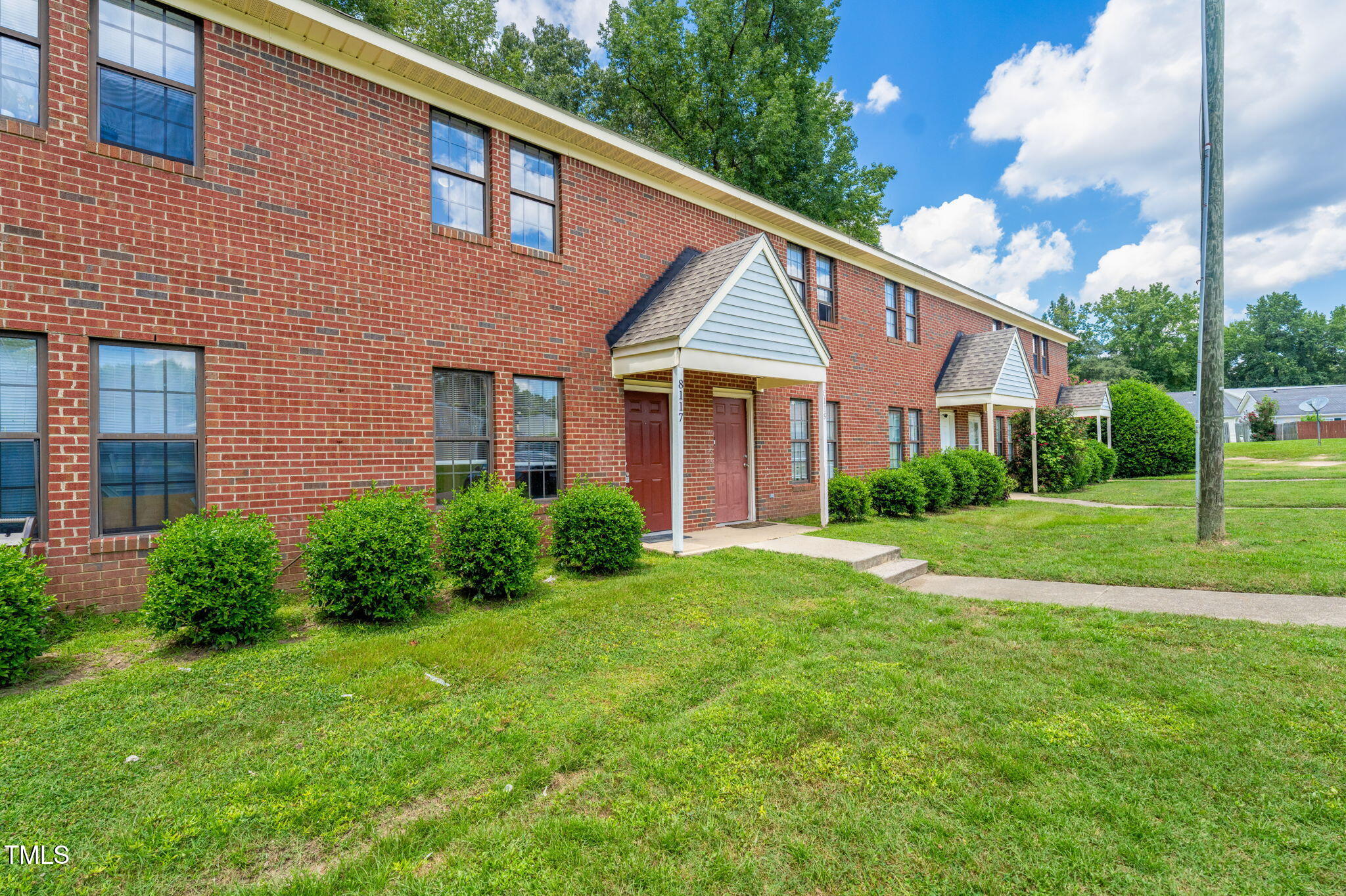 8117 Farmlea Circle Raleigh, NC 27616 - Photo 2 of 20 a front view of a house with garden