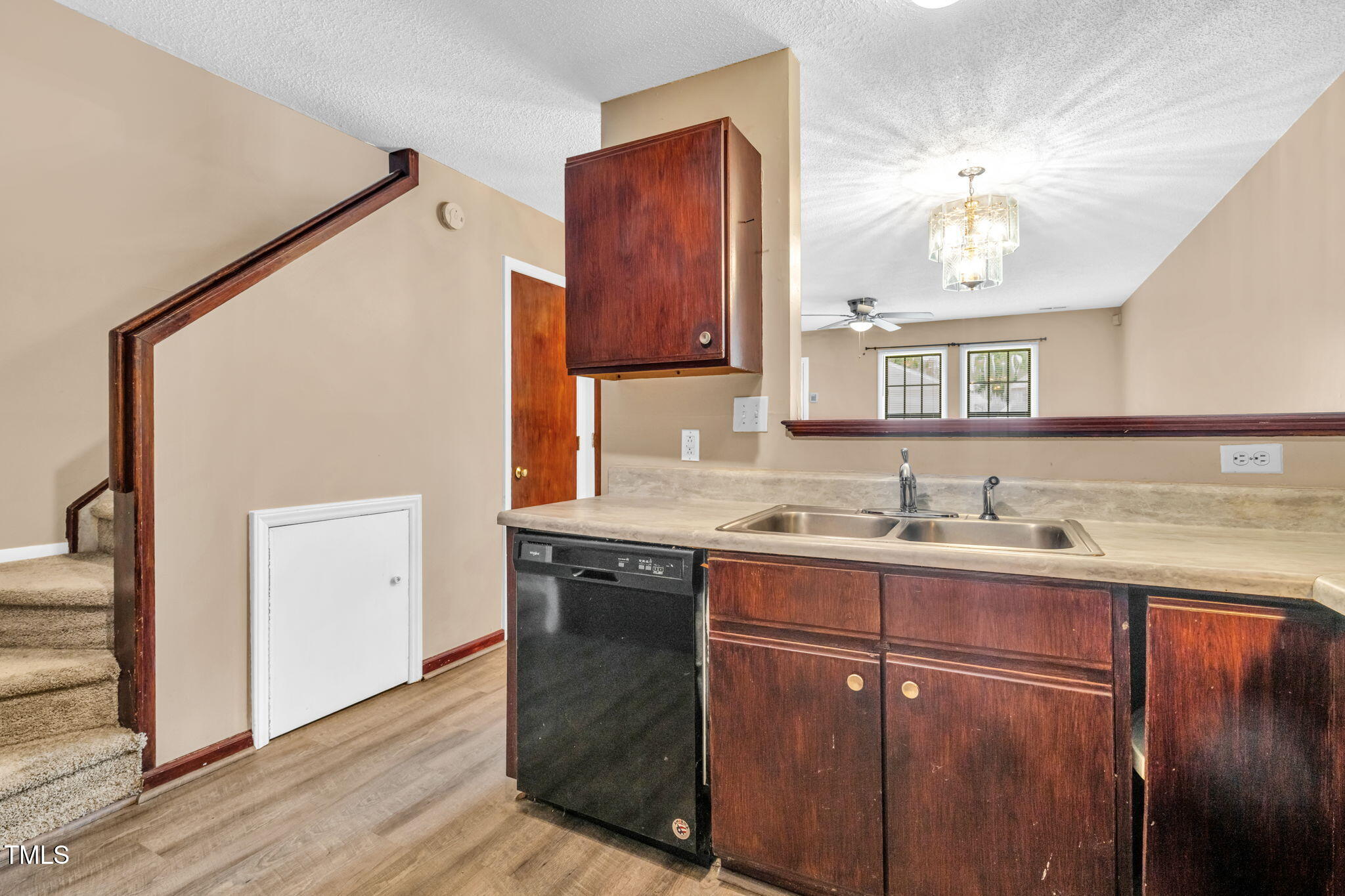 8117 Farmlea Circle Raleigh, NC 27616 - Photo 9 of 20 a bathroom with a granite countertop sink a mirror and vanity