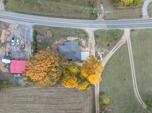 a bathroom with a shower and a bath tub