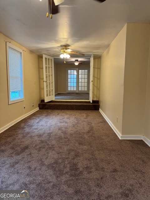 317 Emory Drive Warner Robins, GA 31093 - Photo 16 of 28 an empty room with windows