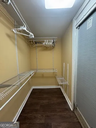 a view of a room with racks on the wall