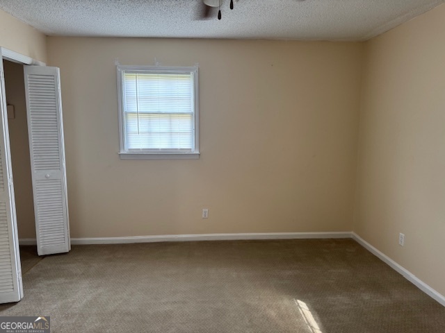 317 Emory Drive Warner Robins, GA 31093 - Photo 22 of 28 a view of an empty room with a window