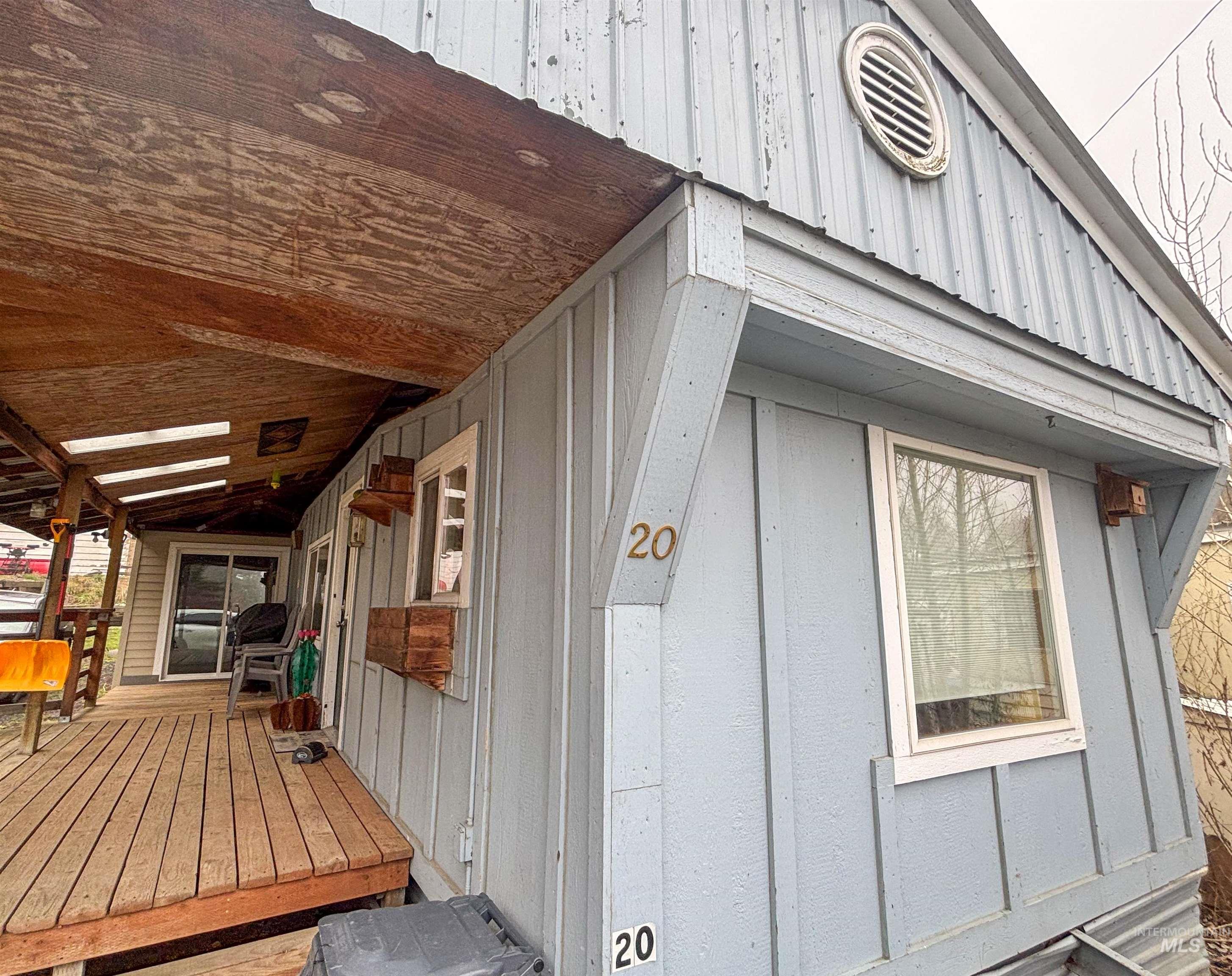 2280 Old Pullman Road, Unit 20 Moscow, ID 83843 - Photo 2 of 20 View of property exterior featuring a deck and board and batten siding