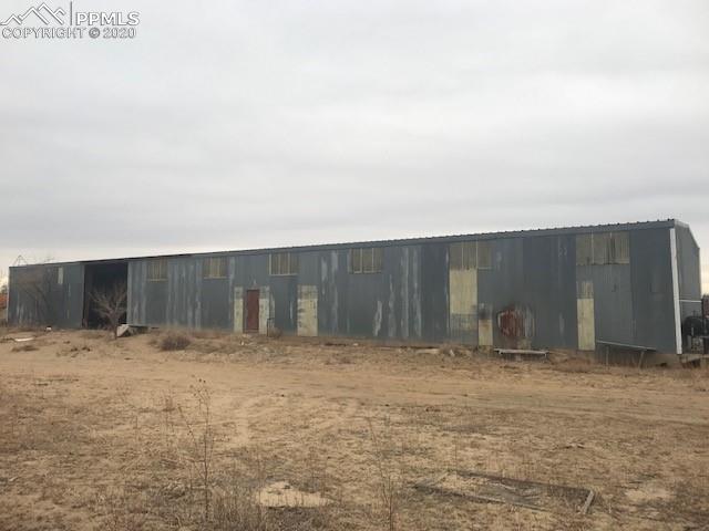 47835 Highway 96 Boone, CO 81025 - Photo 15 of 18 a view of backyard with wooden fence