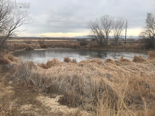 47835 Highway 96 Boone, CO 81025 - Photo 2 of 18 a view of lake with green space