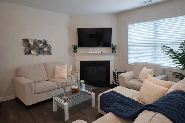 a view of outdoor space with wooden fence