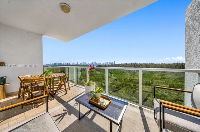 a view of a chairs and table on the terrace