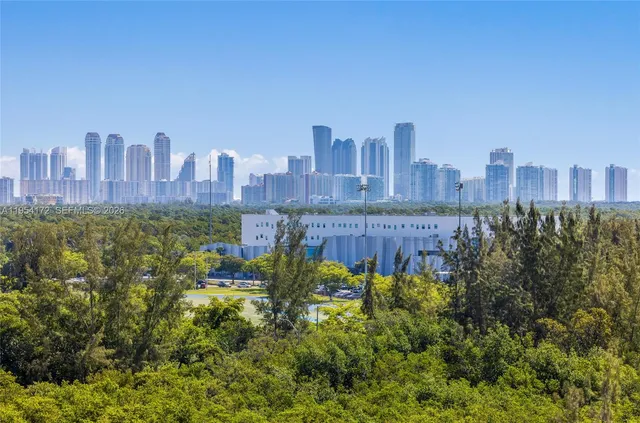 a view of a city with tall buildings